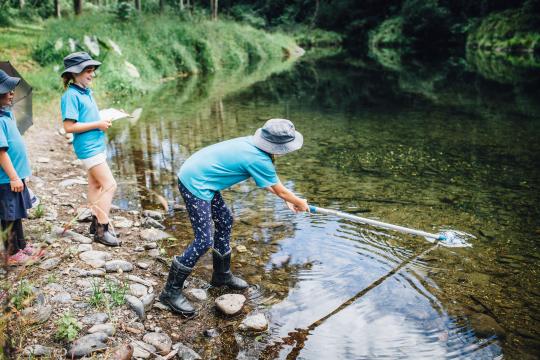 Citizen scientists testing water quality as part of Bellinger Riverwatch. 
